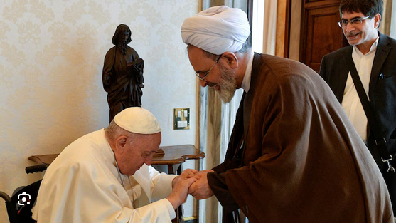 Ayatollah Alireza Arafi and Pope Francis at the Vatican discussing interreligious cooperation and shared global concerns.