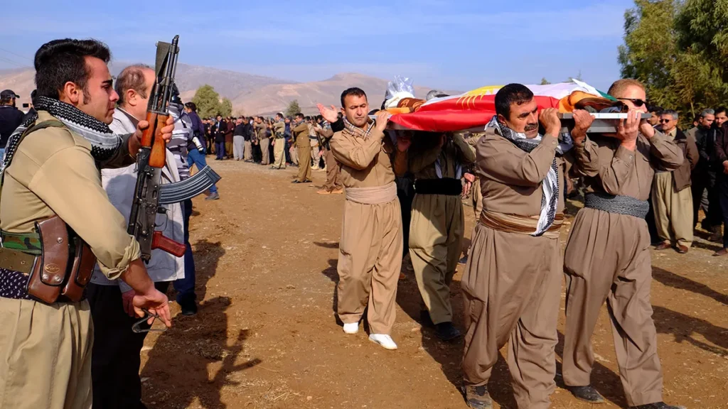 Members of the Kurdistan Democratic Party-Iran attend the funeral of comrades killed in a bomb attack in Koysinjaq in the autonomous Kurdistan region of Iraq.