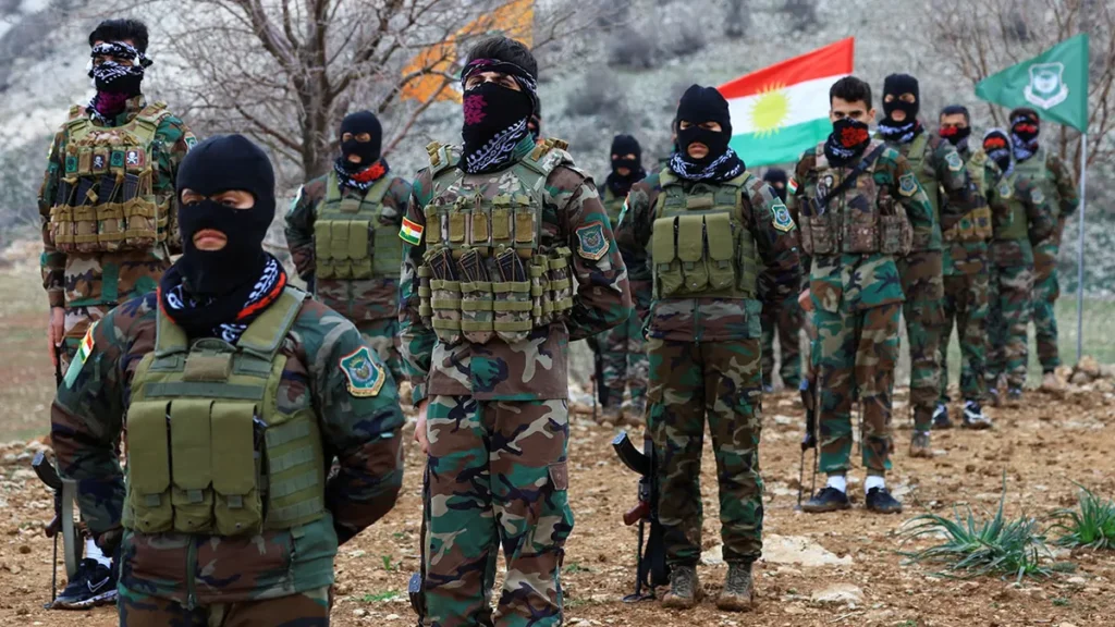 Iranian Kurdish fighters from the Kurdistan Freedom Party (PAK) participate in a military training exercise at a base near Erbil in Iraq’s Kurdistan region.
